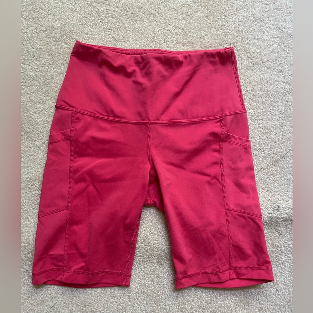 pink yogalicious biker shorts with pockets